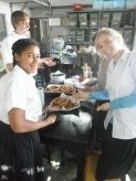Featured Travel Photo - We got to cook in Thai class last wednesday before our city scavenger hunt. I helped make spring rolls. I got to fry them!